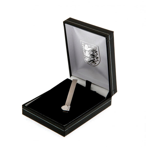 England FA Stainless Steel Tie Slide LKT Sport Stylish and discreet design tie slide Stainless steel pin featuring the England crest With a crocodile clip back Official licensed product Approx 60mm x 12mm Presented in a gift box Tie Clips