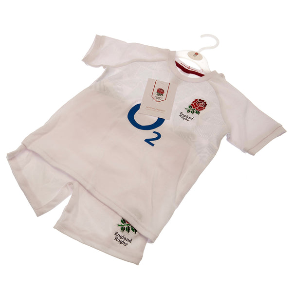 England RFU Shirt & Short Set 6/9 mths PC LKT Sport This t-shirt and short set features the famous England RFU roseHome kit design with an embroidered crest and printed sponsorSoft comfortable fitMain: 100% Cotton, Rib: 96% Cotton and 4% ElastaneOfficial