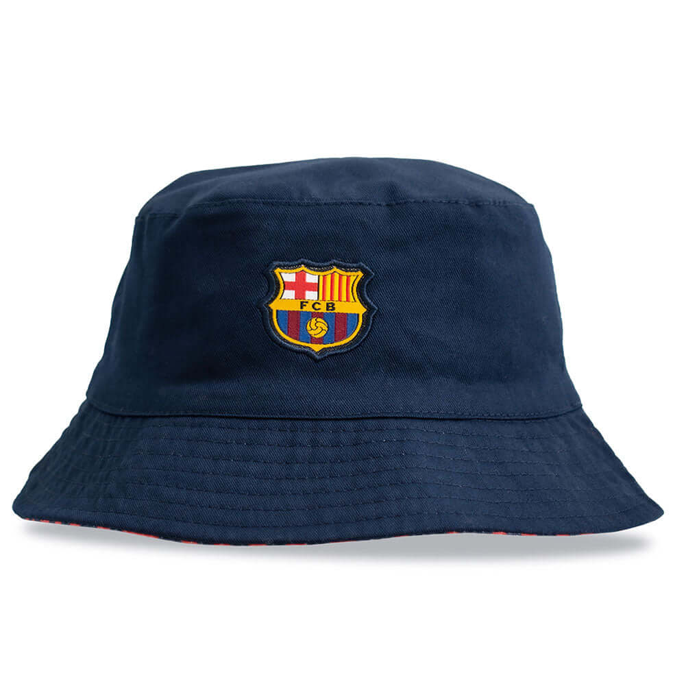 FC Barcelona Bucket Hat LKT Sport Fitted reversible bucket hat in navy with a red and navy pattern on reverseFeatures a woven FCB crestOfficial licensed productAdult, to fit approx 58cm Bucket Hats