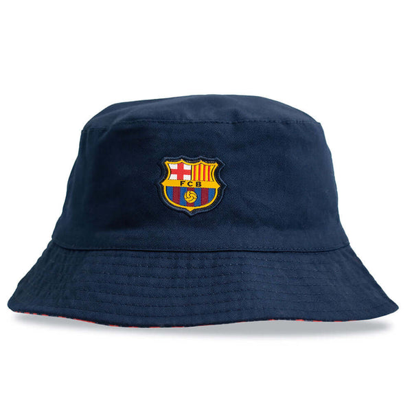 FC Barcelona Bucket Hat LKT Sport Fitted reversible bucket hat in navy with a red and navy pattern on reverseFeatures a woven FCB crestOfficial licensed productAdult, to fit approx 58cm Bucket Hats