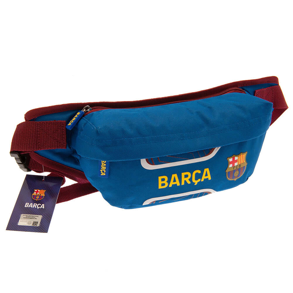 FC Barcelona Flash Cross Body Bag LKT Sport Flash design cross body bag featuring Barca text and club crest2 separate compartments with rubber zip pulls featuring raised Barca detailAdjustable body strapWipe clean polyesterOfficial licensed productApprox