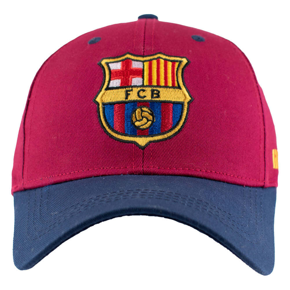 FC Barcelona Red Cap LKT Sport Red and navy classic design curved brim capFeatures a full colour embroidered Barca crestWith a metal buckle size adjuster 55-61cmOfficial licensed productAdults, to fit approx 58cm Caps