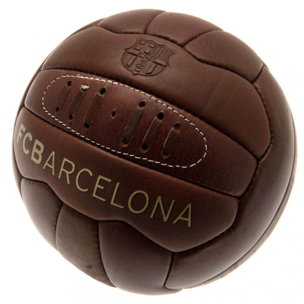 FC Barcelona Retro Heritage Football LKT Sport Genuine leather heritage footballFeaturing gold debossed print Barcelona crest and text18 panel retro style ball with stitched featureOfficial licensed productSize 5 footballApprox 69cm in circumference Socce