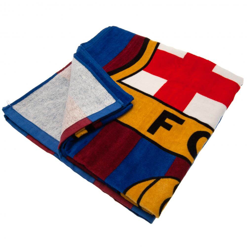 FC Barcelona Towel ST LKT Sport Large soft to touch 100% cotton velour beach towelFeatures a stripe design with a large full colour club crestOfficial licensed productApprox 140cm x 70cm (55in x 28in) Beach Towels