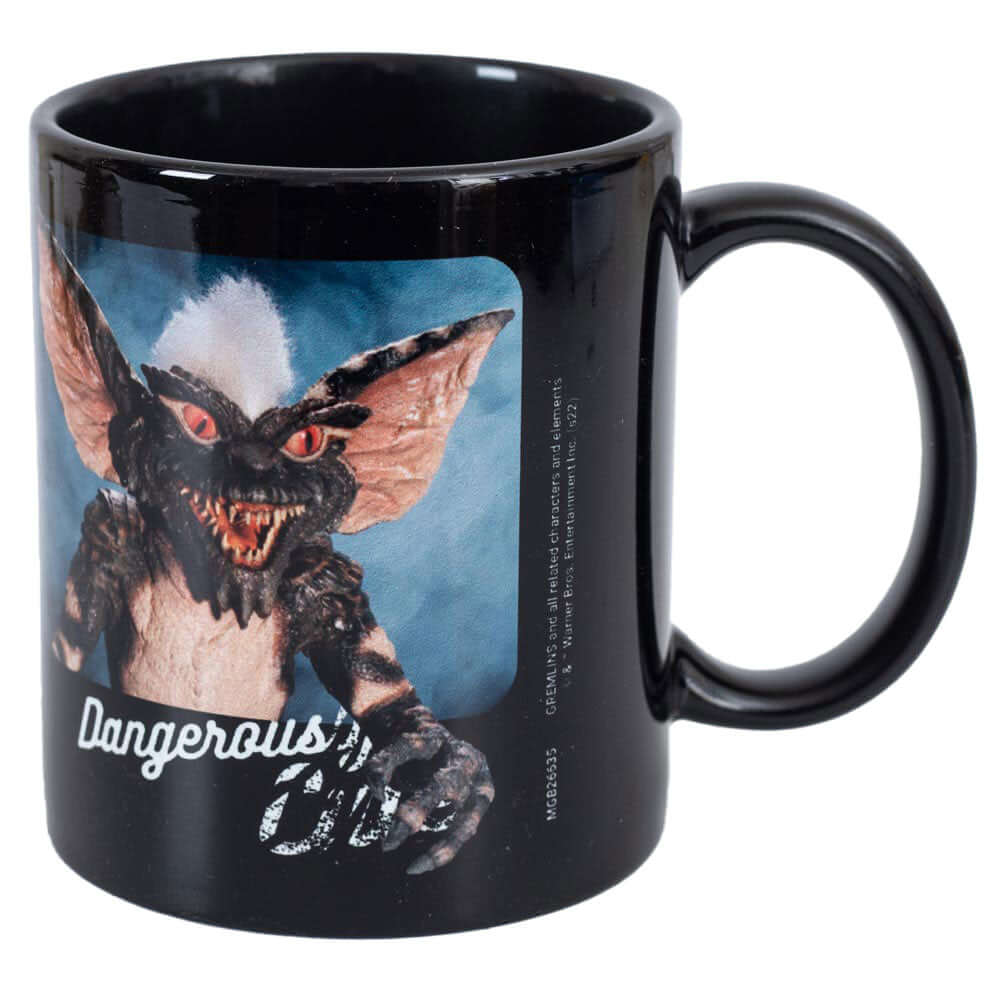 Gremlins Dangerously Cute Mug LKT Sport Ceramic everyday coffee mugBlack mug with two images of the 'Dangerously Cute' GremlinsGlazed kiln fired finishOfficial licensed productApprox 315ml (11oz)Approx 9cm tall, 8cm in diameter Mugs