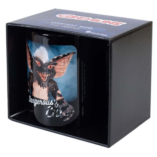Gremlins Dangerously Cute Mug LKT Sport Ceramic everyday coffee mugBlack mug with two images of the 'Dangerously Cute' GremlinsGlazed kiln fired finishOfficial licensed productApprox 315ml (11oz)Approx 9cm tall, 8cm in diameter Mugs
