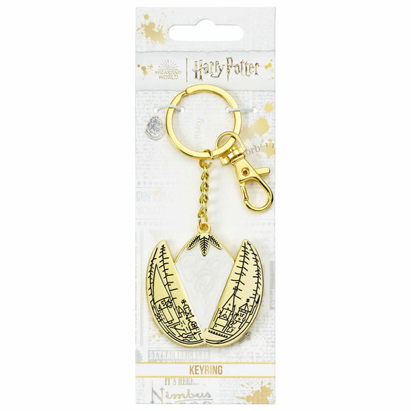 Harry Potter Charm Keyring Golden Egg LKT Sport Metal die stamped charm keyring with chain and split ringFeaturing the famous Golden Egg encassed in a white pearlescent shellMetal alloy with gold style finishOfficial licensed productApprox 50mm x 50mm Key