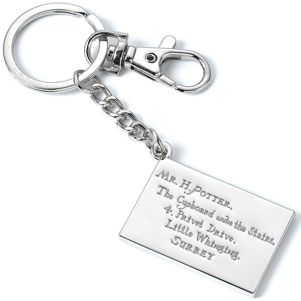 Harry Potter Charm Keyring Letter LKT Sport Metal die stamped charm keyring with chain and split ringFeaturing the Hogwarts acceptance letterMetal alloy with silver style finishOfficial licensed productApprox 40mm x 30mm Keychains