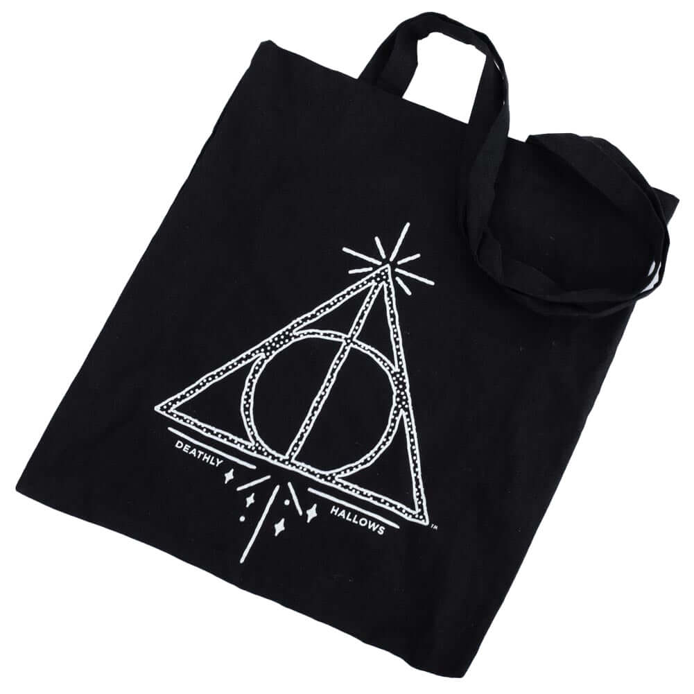 Harry Potter Deathly Hallows Canvas Tote Bag LKT Sport Black canvas tote bag featuring the Deathly Hallows sign in whiteMade from 100% Cotton canvas materialOfficial licensed productApprox 41cm x 37cm Tote Bags