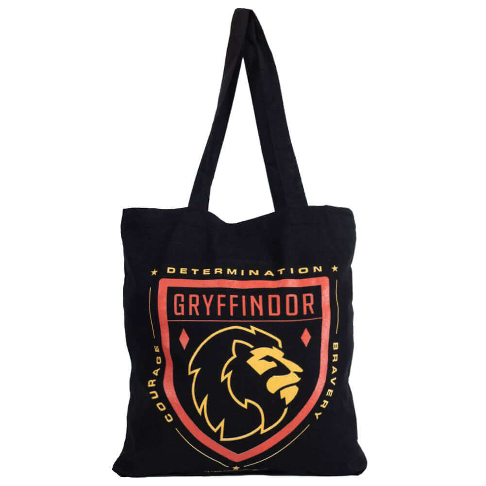 Harry Potter Gryffindor Canvas Tote Bag LKT Sport Black canvas tote bag featuring a large red and yellow Gryffindor crest to one sideMade from 100% Cotton canvas materialOfficial licensed productApprox 41cm x 37cm Tote Bags