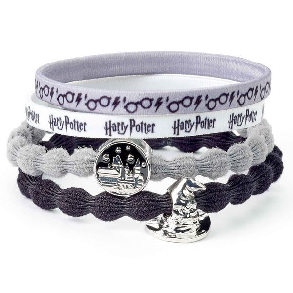 Harry Potter Hair Bands Hogwarts LKT Sport Premium hair accessories set1 x Grey band with a Hogwarts charm1 x Black band with a Sorting Hat charm1 x White band with a Harry Potter text pattern1 x Grey band with a Glasses and Lightning Bolt patternOfficial