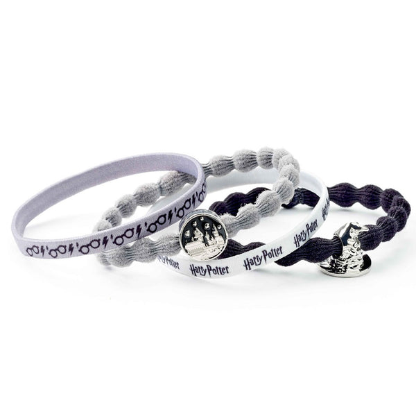 Harry Potter Hair Bands Hogwarts LKT Sport Premium hair accessories set1 x Grey band with a Hogwarts charm1 x Black band with a Sorting Hat charm1 x White band with a Harry Potter text pattern1 x Grey band with a Glasses and Lightning Bolt patternOfficial