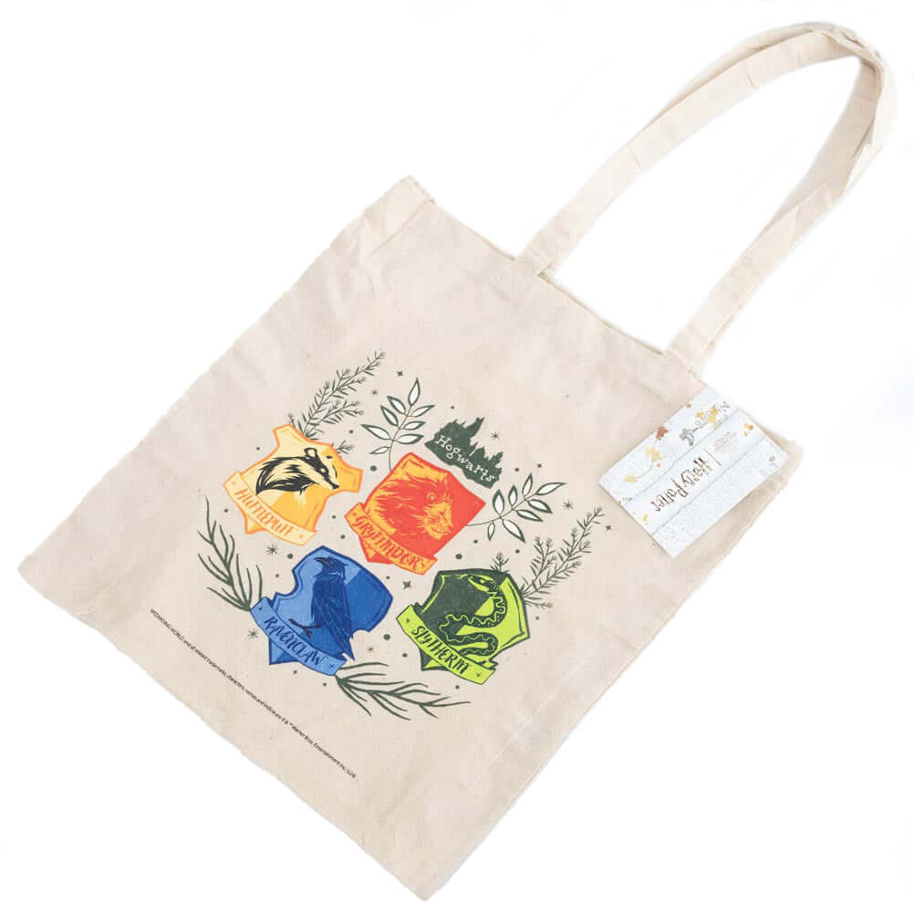 Harry Potter Herbology Canvas Tote Bag LKT Sport Cream tote bag featuring a vibrant collection of the Hogwarts Herbology crestsMade from 100% Cotton canvas materialOfficial licensed productApprox 41cm x 37cm Tote Bags