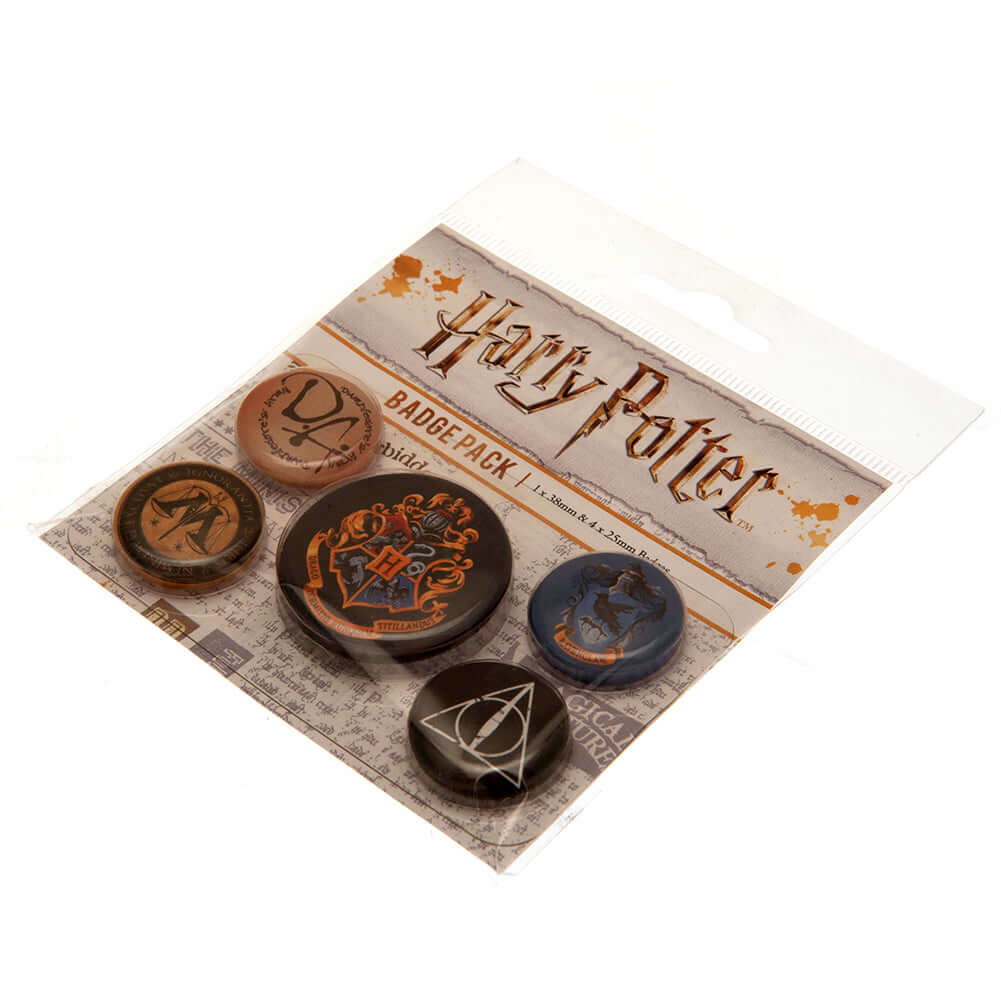 Harry Potter Hogwarts Button Badge Set LKT Sport Eye-catching designs and slogan badgesIdeal addition to school bags or clothingFasten with a safety pin fixingOfficial licensed product5 assorted size badges Pinback Buttons