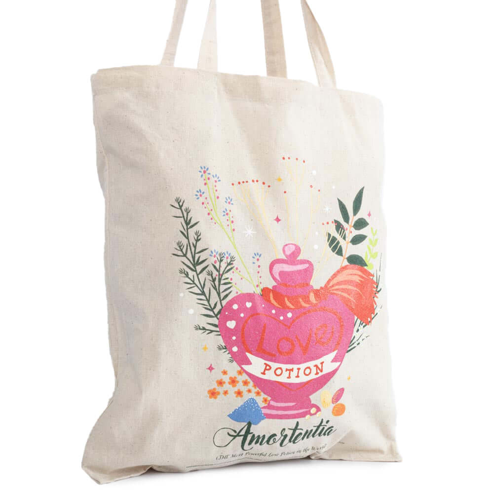 Harry Potter Love Potion Canvas Tote Bag LKT Sport Cream canvas tote bag featuring a vibrant image of the Amortentia Love Potion to one sideMade from 100% Cotton canvas materialOfficial licensed productApprox 41cm x 37cm Tote Bags