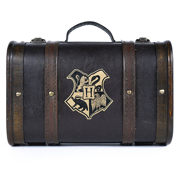 Harry Potter Premium Gift Set LKT Sport A wooden suitcase style box with a carrying handle and removable shoulder strapThe trunk features a gold printed Hogwarts Crest and contains1 x 350ml metal thermal bottle with a gold screw top lid4 x 'Expecto Patron