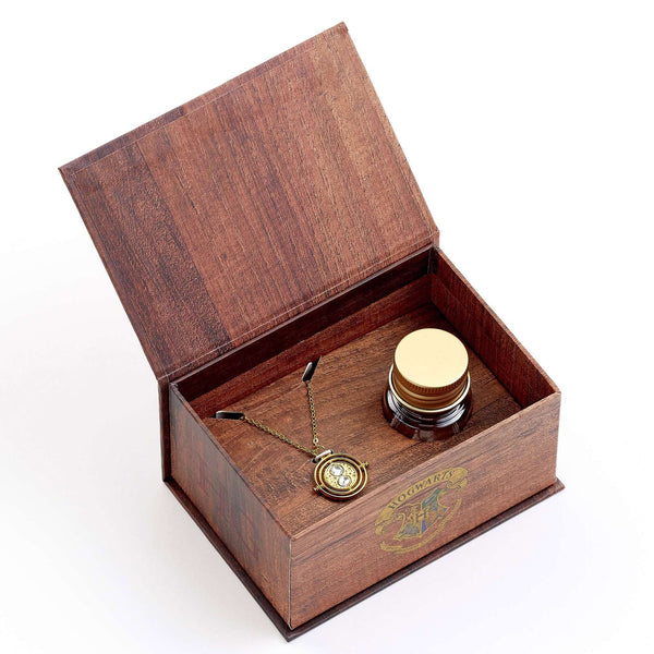 Harry Potter Time Turner Necklace & Earrings Gift Box LKT Sport This unique collectable potion gift box is inspired by the one Hermoine used to create her Polyjuice potionFeaturing compartments with a potion bottle containing Time Turner stud earrings and