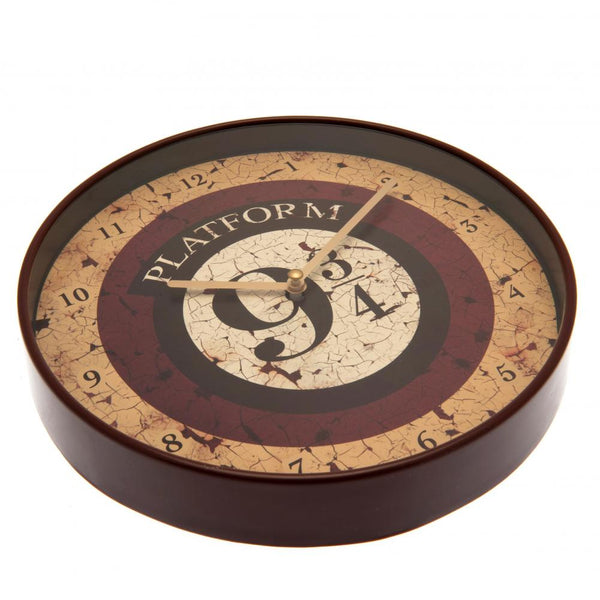 Harry Potter Wall Clock 9 & 3 Quarters LKT Sport Hanging wall clock with a large central Platform 9 & 3 Quarters design Durable plastic case with a clear font and modern quartz movement Official licensed product Approx 25cm in diameter In a display box Wa
