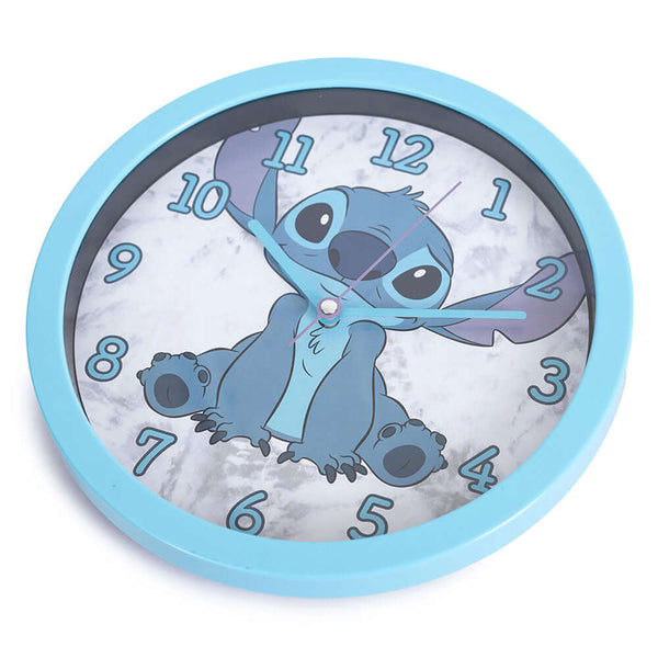 Lilo & Stitch Wall Clock LKT Sport Sky blue hanging wall clock featuring Stitch on the faceDurable plastic case with a clear font and modern quartz movementRequires x1 AA Battery (not included)Official licensed productApprox 25cm in diameter Wall Clocks