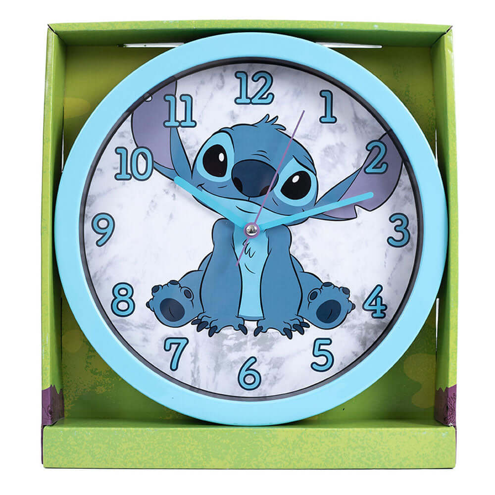 Lilo & Stitch Wall Clock LKT Sport Sky blue hanging wall clock featuring Stitch on the faceDurable plastic case with a clear font and modern quartz movementRequires x1 AA Battery (not included)Official licensed productApprox 25cm in diameter Wall Clocks