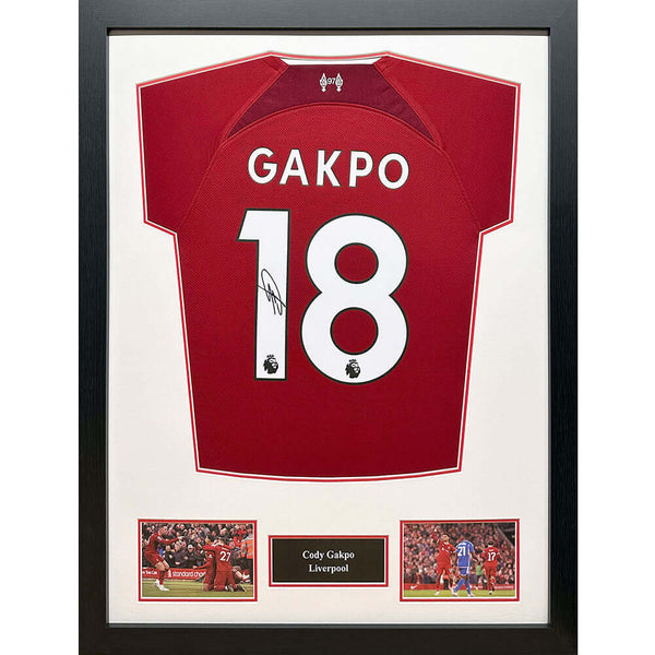 Liverpool FC Gakpo Signed Shirt (Framed) LKT Sport Liverpool FC 2022-2023 season replica shirtHand signed on the number by Cody GapkoPersonally signed in Liverpool on the 7th November 2023Featuring imagery and the text Cody Gakpo, LiverpoolMounted in a st