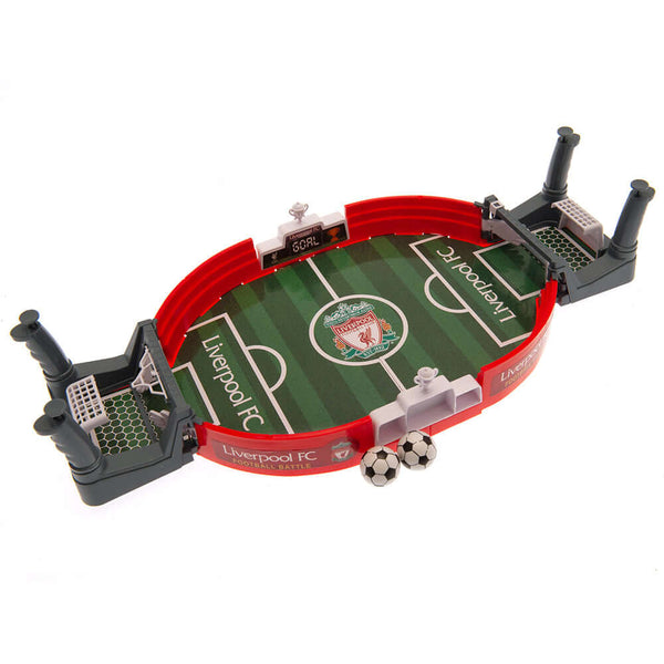Liverpool FC Mini Football Game LKT Sport Table top football game in a branded pitch designFun 2 player game, aged 3 upwardsEasy to assemble constructionIncludes a sliding score indicator at either endComplete with two plastic ballsOfficial licensed produ
