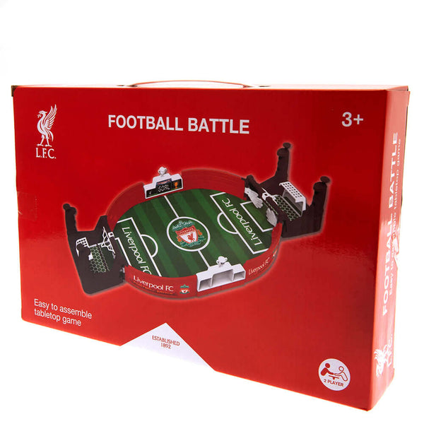 Liverpool FC Mini Football Game LKT Sport Table top football game in a branded pitch designFun 2 player game, aged 3 upwardsEasy to assemble constructionIncludes a sliding score indicator at either endComplete with two plastic ballsOfficial licensed produ