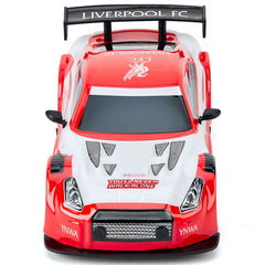 Liverpool FC Radio Control Sportscar 1:24 Scale LKT Sport Sleek and streamlined sportscar with iconic style brandingComplete with a Liverbird crest on the roof and the slogan 'You'll never walk alone' on the bonnet and doorsIncludes an oversized spoiler o