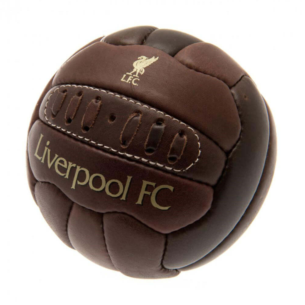 Liverpool FC Retro Heritage Mini Ball LKT Sport Genuine leather heritage footballFeaturing gold print Liverpool crest and text18 panel retro style ball with stitched featureOfficial licensed productSize 1 footballApprox 47cm in circumference Soccer Traini Main image