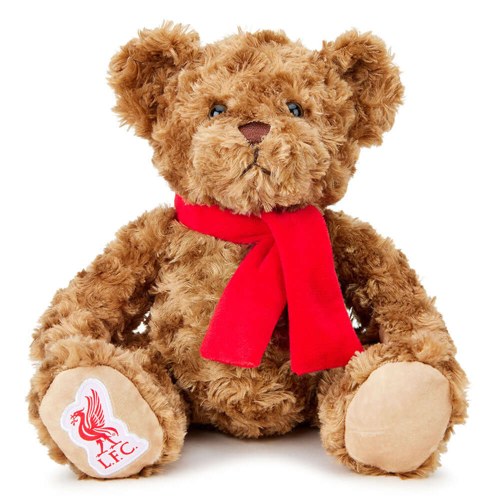 Liverpool FC Supersoft Classic Bear LKT Sport Super soft classic bear in sitting position with beaded eyesWearing a vibrant red scarf with a Liverbird and L.F.C. on the bears paw100% polyesterOfficial licensed productApprox 25cm in sitting position Stuffe