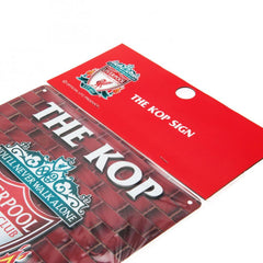 Liverpool FC The Kop Sign LKT Sport Iconic design stamped metal wall sign Featuring a large Liverpool crest and The Kop text Ready to hang on the wall with four small holes for fixing Official licensed product Approx 23cm x 25cm On a header card Novelty S