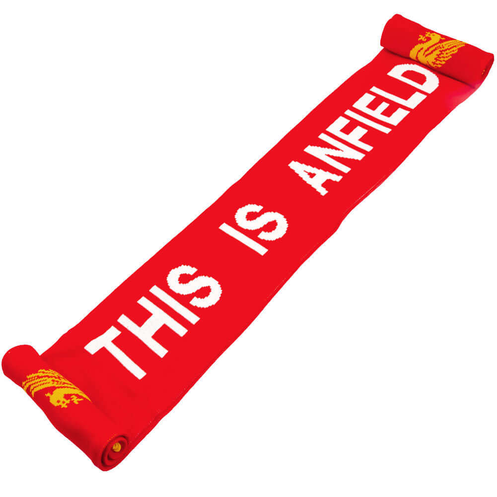 Liverpool FC This Is Anfield Scarf LKT Sport Red and white double sided jacquard knit scarf with a yellow fringeBoth sides feature This Is Anfield text and large Liverbird club crest at either endOfficial licensed productApprox 135cm x 19cm Scarves Imagen principal del producto