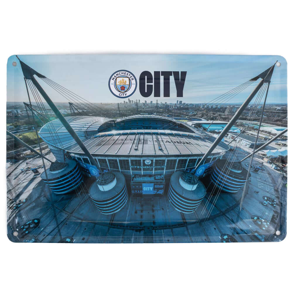 Manchester City FC 2pk Stadium Sign LKT Sport Pair of metal stadium photo signs both including a full colour Man City crestReady to hang on the wall with four small holes for fixingOfficial licensed productApprox 30cm x 20cm Novelty Signs
