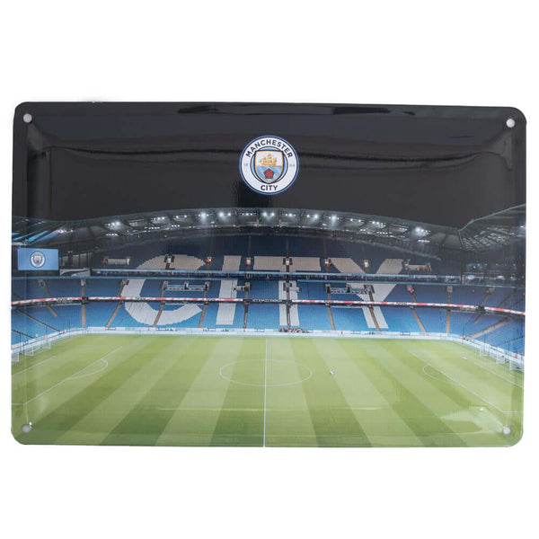 Manchester City FC 2pk Stadium Sign LKT Sport Pair of metal stadium photo signs both including a full colour Man City crestReady to hang on the wall with four small holes for fixingOfficial licensed productApprox 30cm x 20cm Novelty Signs