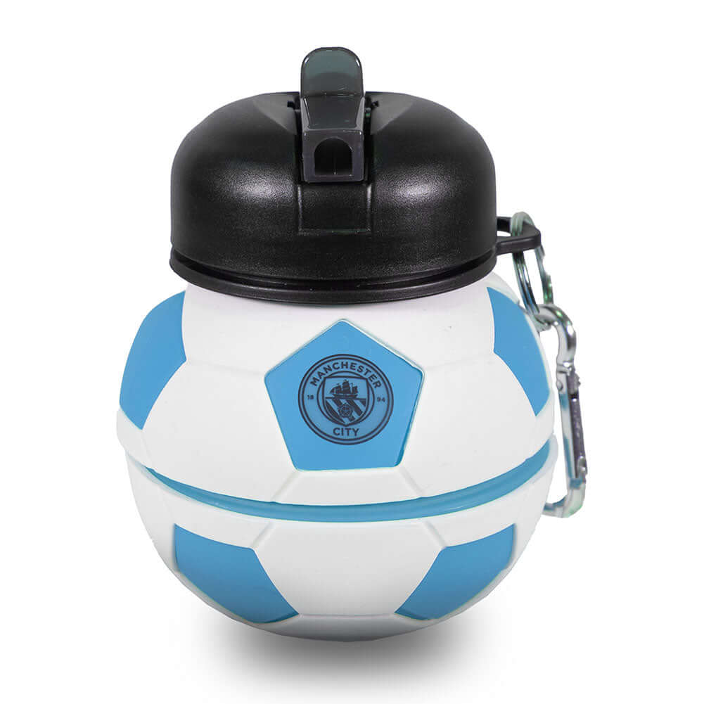Manchester City FC Collapsible Football Drinks Bottle LKT Sport Collapsible football shaped drinks bottleFeaturing a navy City crest and textScrew top lid with a handy carabiner clipOfficial licensed productApprox 550ml (oz)Approx 17cm tall when extended,