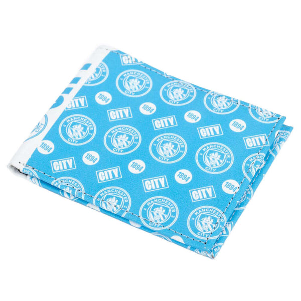 Manchester City FC Coloured Icon Wallet LKT Sport Vibrant brushed canvas wallet featuring an Man City multi icon designBi-fold design with 1 note pocket and 4 card slotsincluding a window and 2 additional slotsOfficial licensed productApprox 11cm x 9cm Wa