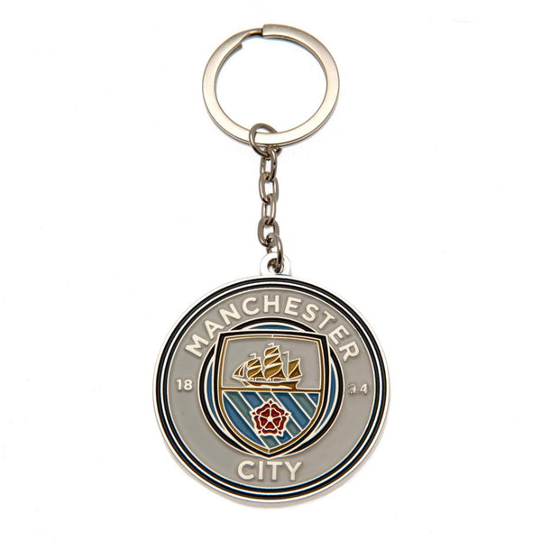 Manchester City FC Crest Keyring LKT Sport Metal crest shaped keyring with chain and split ring Die stamped design with full colour enamel infill Metal alloy with silver style finish Official licensed product Approx 45mm x 45mm On a header card Keychains