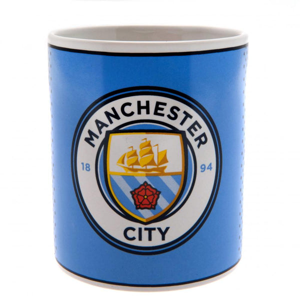 Manchester City FC Fade Mug LKT Sport Ceramic everyday coffee mug Fade design featuring Manchester City text and a full colour club crest Glazed kiln fired finish with white handle Official licensed product Approx 315ml (11oz) Approx 9cm tall, 8cm in diam