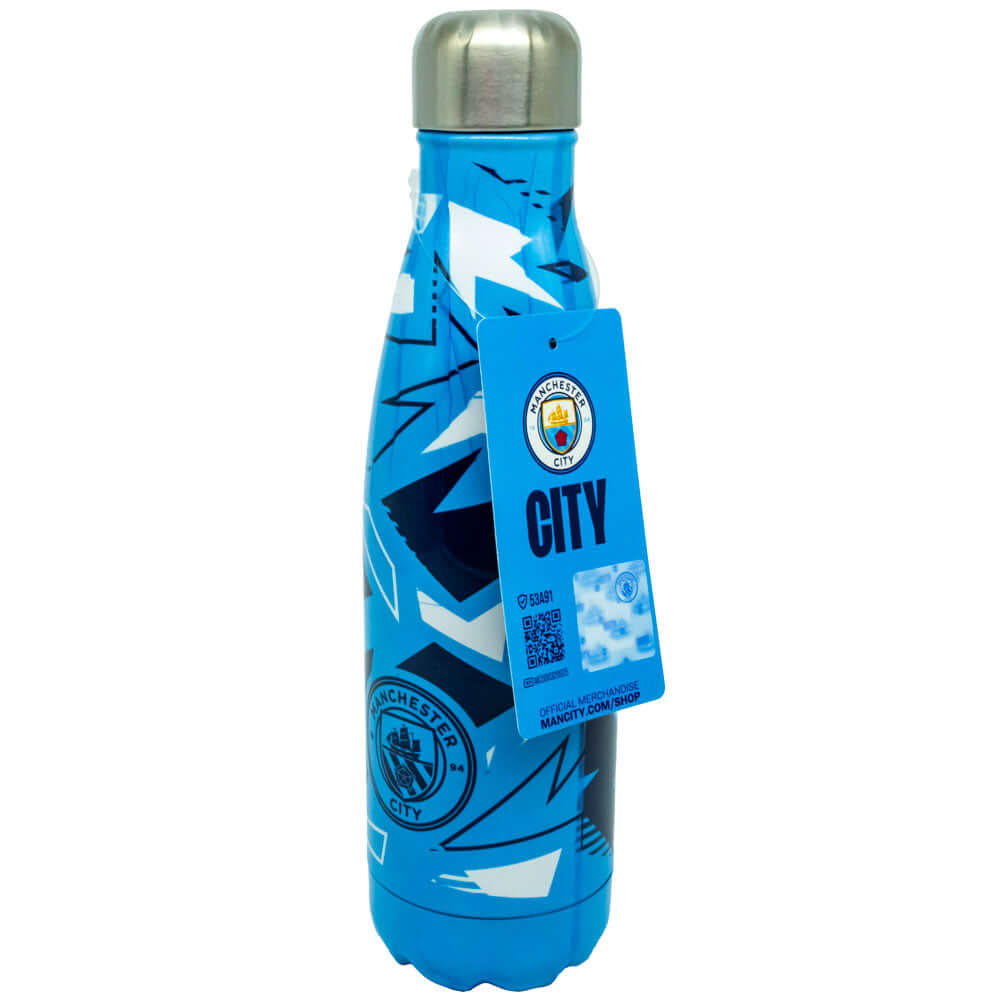 Manchester City FC Fragment Thermal Flask LKT Sport Stainless steel thermal vacuum flaskSky blue and navy fragment pattern with a navy Man City crestMaintains the temperature of your drink for up to 24hrsWith a screw top lidOfficial licensed productApprox