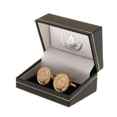 Manchester City FC Gold Plated Cufflinks LKT Sport Gold Plated round cufflinksFeaturing a highly detailed formed City crestOn a bullet back fixingOfficial licensed productApprox 22mm x 19mm Cufflinks