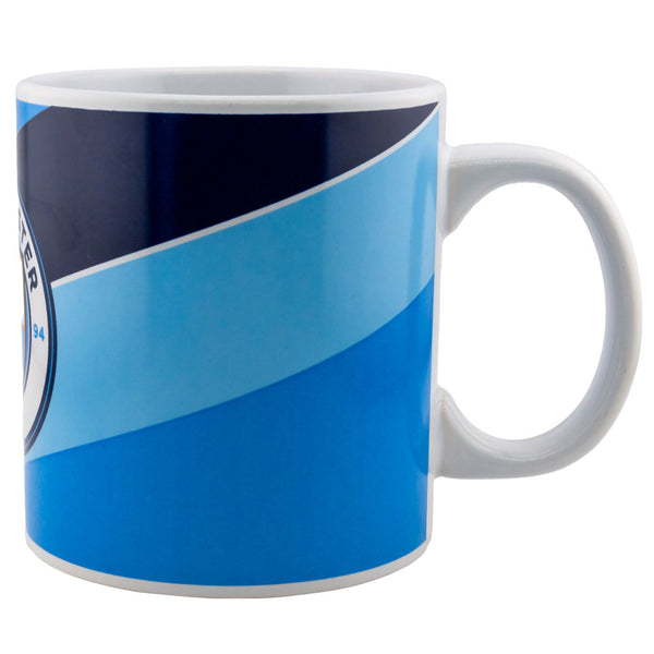 Manchester City FC Jumbo Mug LKT Sport Jumbo size everyday ceramic coffee mugDiagonal stripe design featuring a large club crestOfficial licensed productApprox 600ml (20oz)Approx 11cm tall, 10cm in diameter Mugs