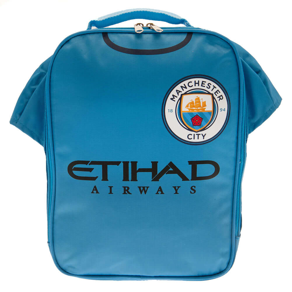 Manchester City FC Kit Lunch Bag LKT Sport Home shirt design lunch bag featuring Etihad Airways text and club crestDouble zipped opening for easy accessWith carry handle and name tagWipe clean polyesterOfficial licensed productApprox 29cm x 24cm x 7cm Lun