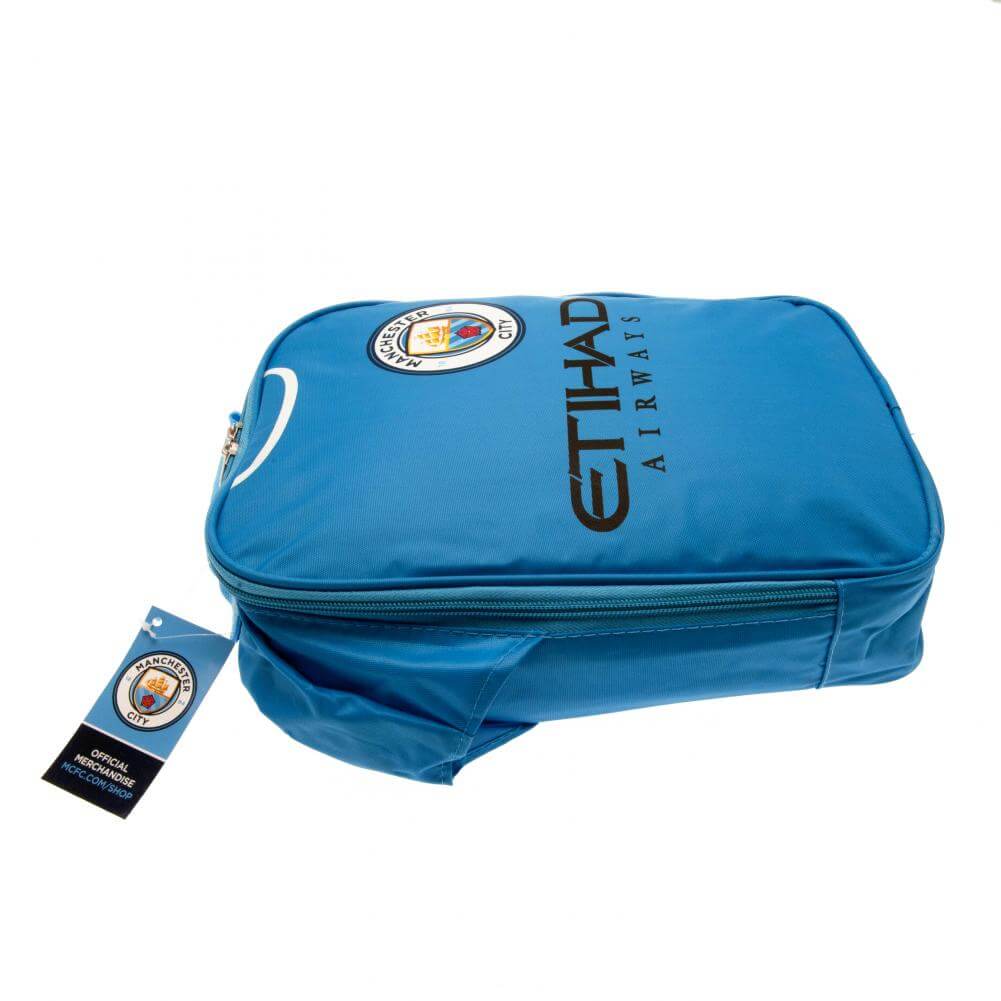 Manchester City FC Kit Lunch Bag LKT Sport Home shirt design lunch bag featuring Etihad Airways text and club crestDouble zipped opening for easy accessWith carry handle and name tagWipe clean polyesterOfficial licensed productApprox 29cm x 24cm x 7cm Lun