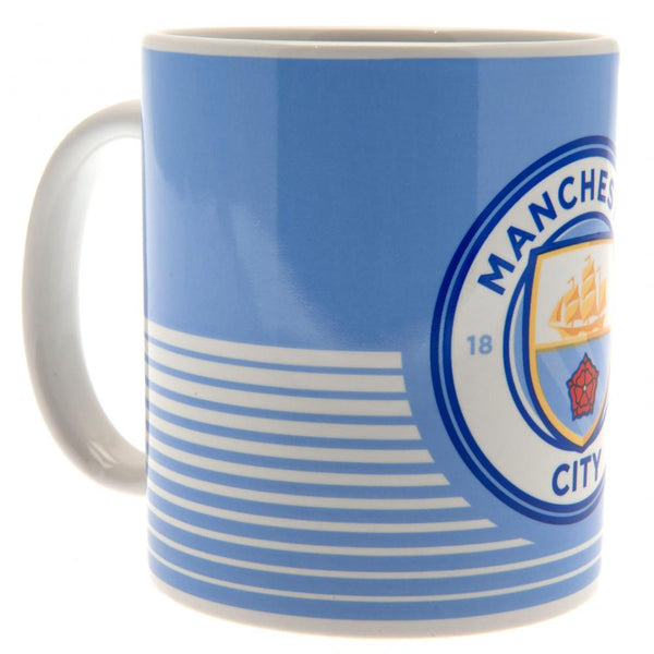 Manchester City FC Linea Mug LKT Sport Ceramic everyday coffee mug Linea design featuring a full colour Man City club crest Glazed kiln fired finish with white handle Official licensed product Approx 315ml (11oz) Approx 9cm tall, 8cm in diameter In a prin