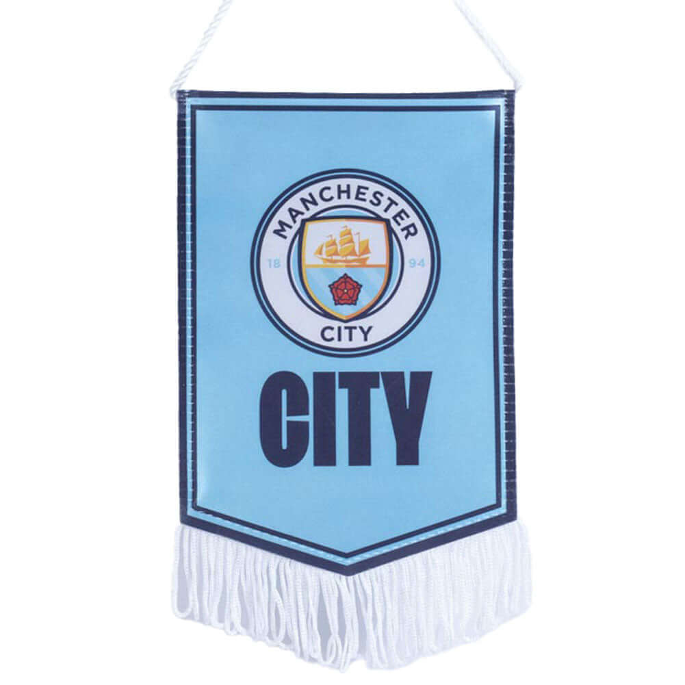 Manchester City FC Mini Pennant LKT Sport Satin look crest design pennantFeaturing a full colour Man City crest with the text CITY underneath on a sky blue backgroundFinished with white tassels and hanging stringIdeal for your car or windowOfficial licens