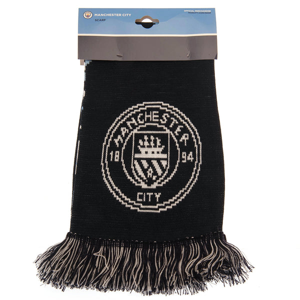 Manchester City FC Particle Scarf LKT Sport Sky blue, white, navy blue and baby blue particle knit with a navy fringeBoth sides feature a large white Man City club crest at each endOfficial licensed productApprox 152cm x 19cm Scarves