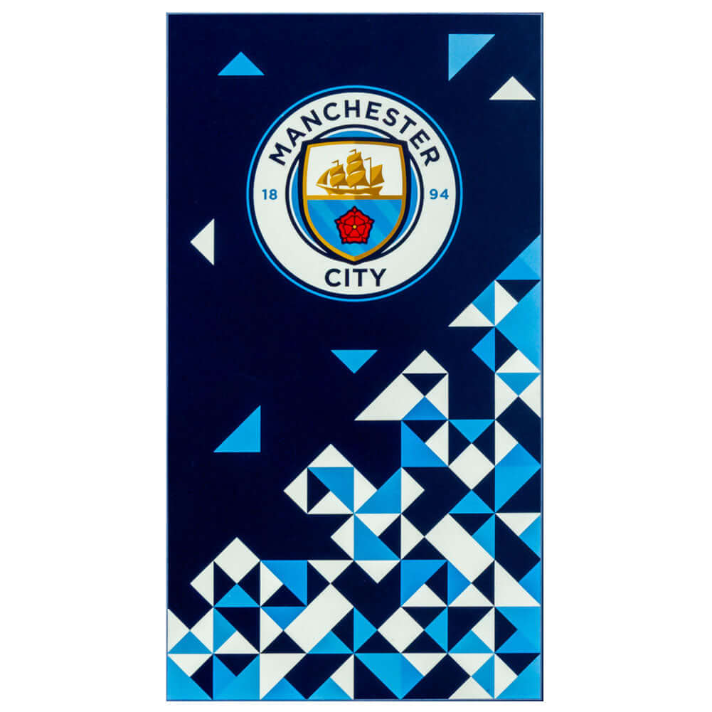 Manchester City FC Particle Towel LKT Sport Large soft to touch 100% cotton velour beach towelFeatures a particle design with a large crestOfficial licensed productApprox 140cm x 70cm (55in x 28in) Beach Towels
