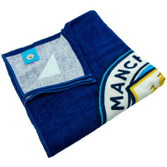 Manchester City FC Particle Towel LKT Sport Large soft to touch 100% cotton velour beach towelFeatures a particle design with a large crestOfficial licensed productApprox 140cm x 70cm (55in x 28in) Beach Towels