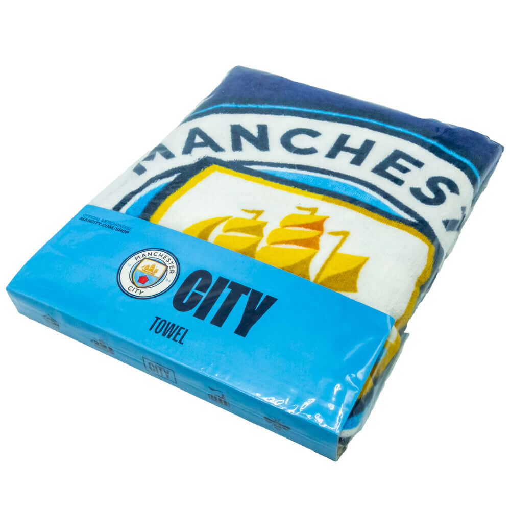 Manchester City FC Particle Towel LKT Sport Large soft to touch 100% cotton velour beach towelFeatures a particle design with a large crestOfficial licensed productApprox 140cm x 70cm (55in x 28in) Beach Towels