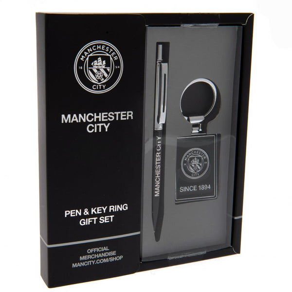 Manchester City FC Pen & Keyring Set LKT Sport Executive pen & keyring gift set 1 x executive pen with black ink 1 x large executive rectangle keyring Official licensed product Pen approx 13cm x 1cm Keyring approx 45mm x 35mm In a gift box Pen & Pencil Se